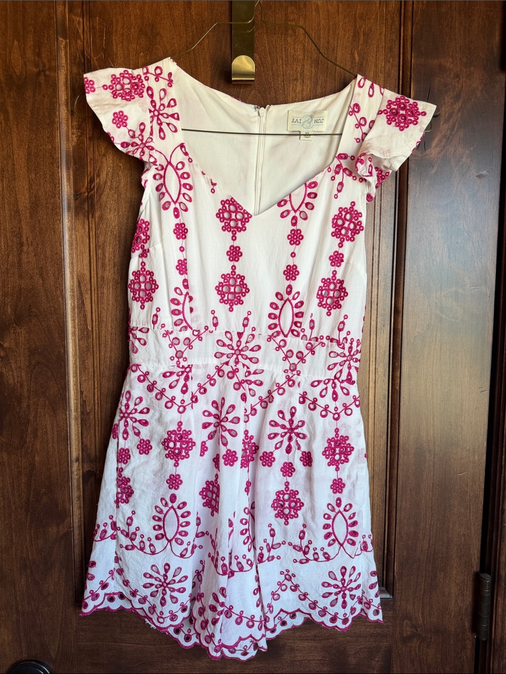 Girls' White Romper with Bright Pink Embroidery and pockets